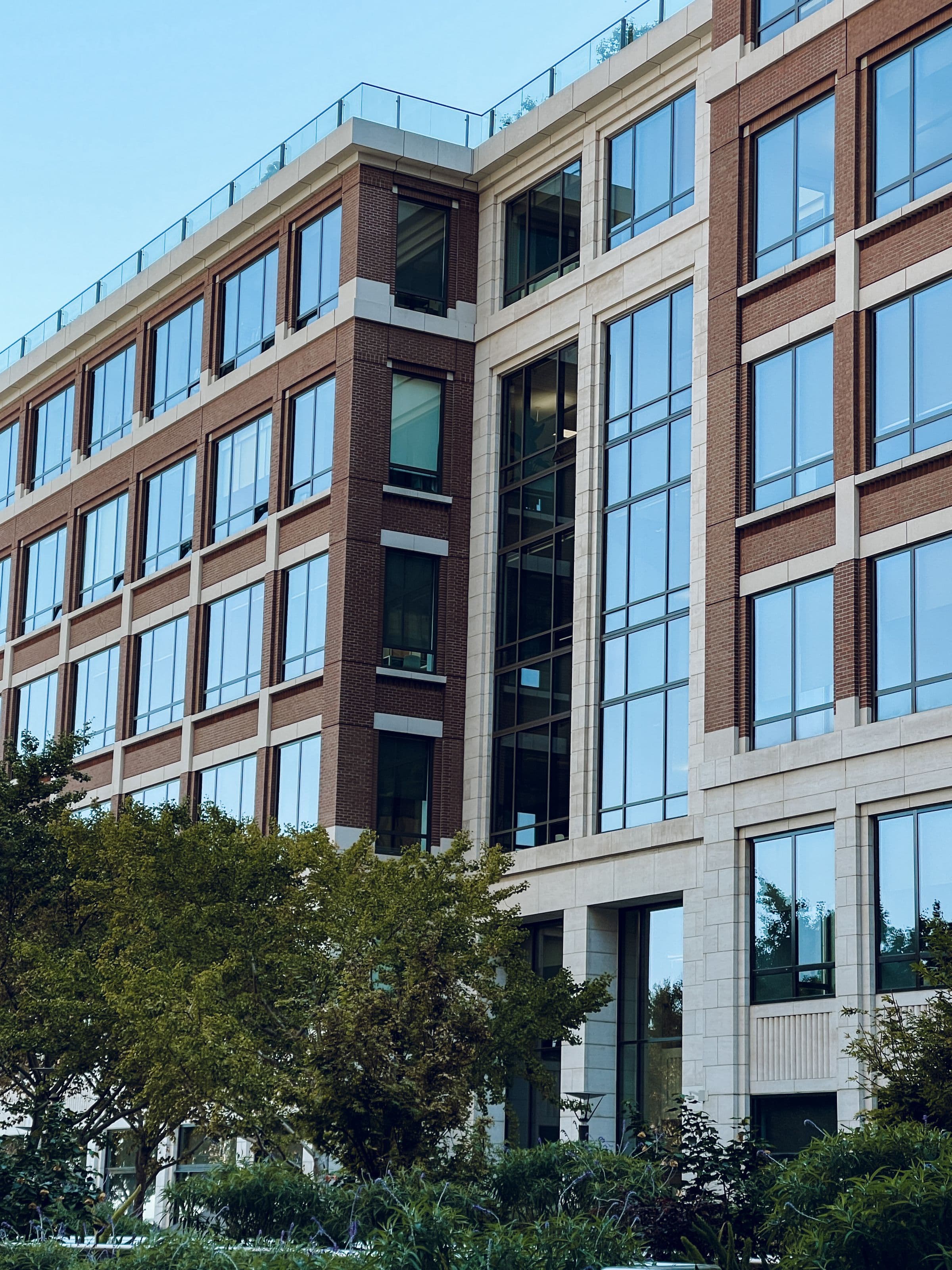 A modern corporate office building with a glass facade